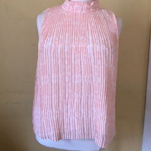 Sleeveless satin pink blouse with shell